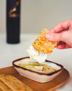 crackers and maknoon olive oil bottle